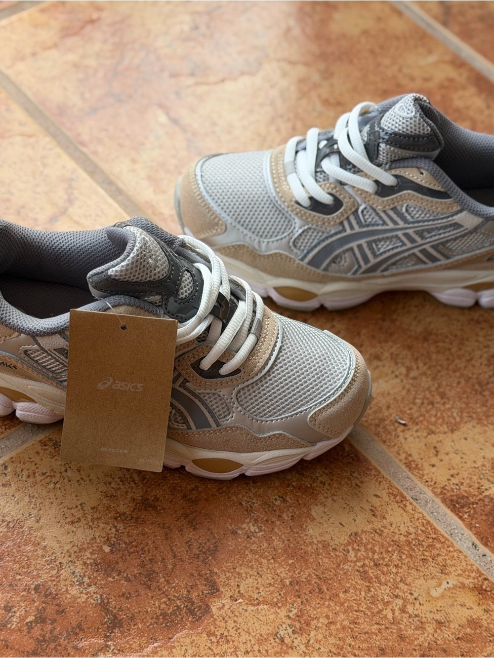 Size 5.5 Woman’s And Men’s 4 - Asics Gel NYC Beige and Gray Athletic Sneakers
